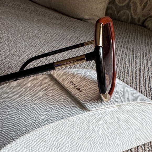 Prada Women\'s Orange Sunglasses with Gold Accents